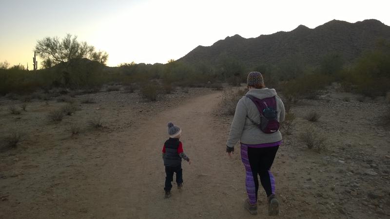 Katie and Noah walking down the trail