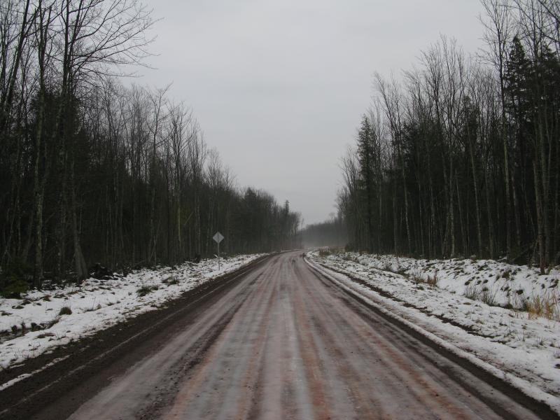 Icy, slushy dirt road heading north