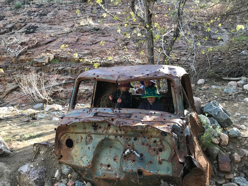 Kids checking out the old truck near Pocket Creek