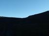 Dim silhouette of Sandy Saddle in the morning