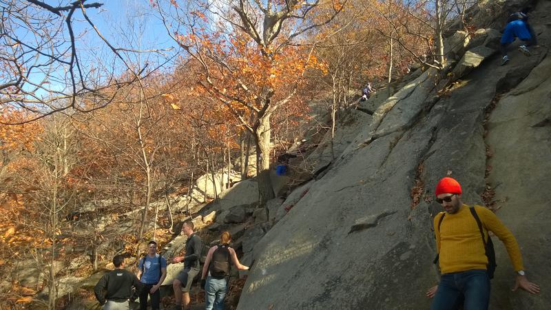 Finding ways up the steep rock slope