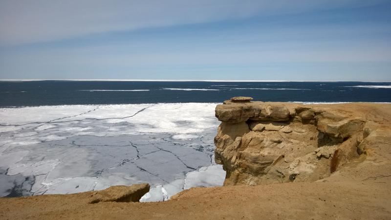 Cracked rocks high above the cracked ice