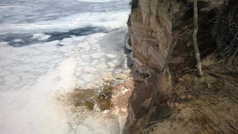 Evidence of recent erosion below the cliffs