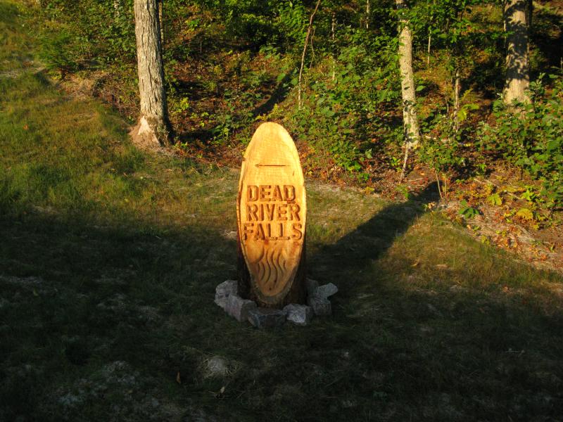 Early morning sun on the new trail marker