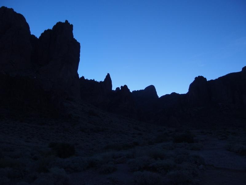 Bright skies over distant rock towers