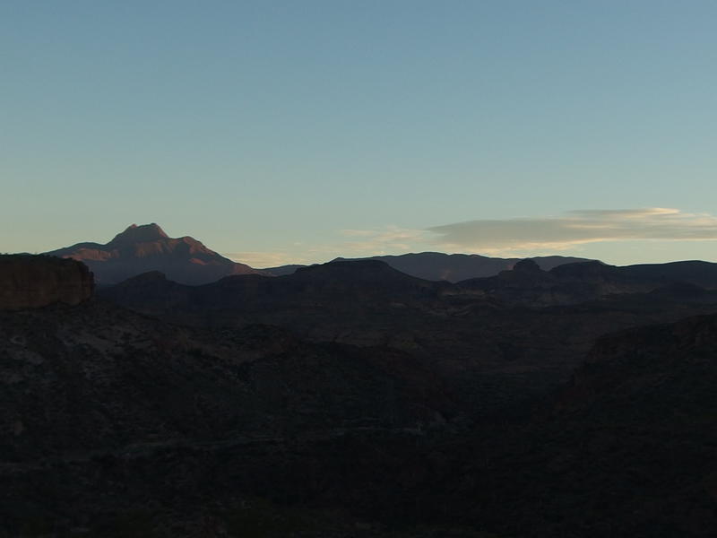 Sun beginning to shine on Four Peaks