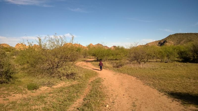 Noah running fast down the wide path