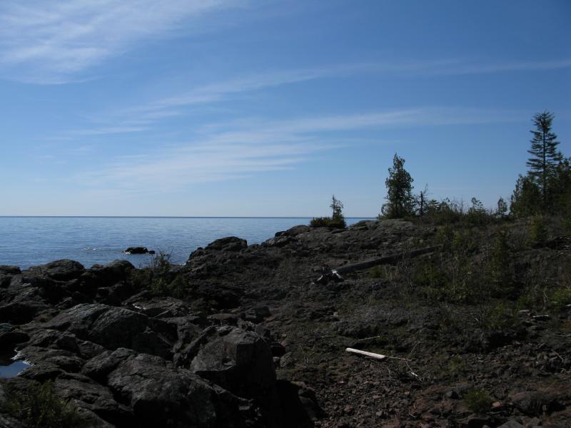 Barren basalt outcroppings along the shore