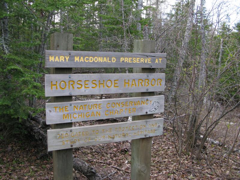 Large sign just past the trailhead