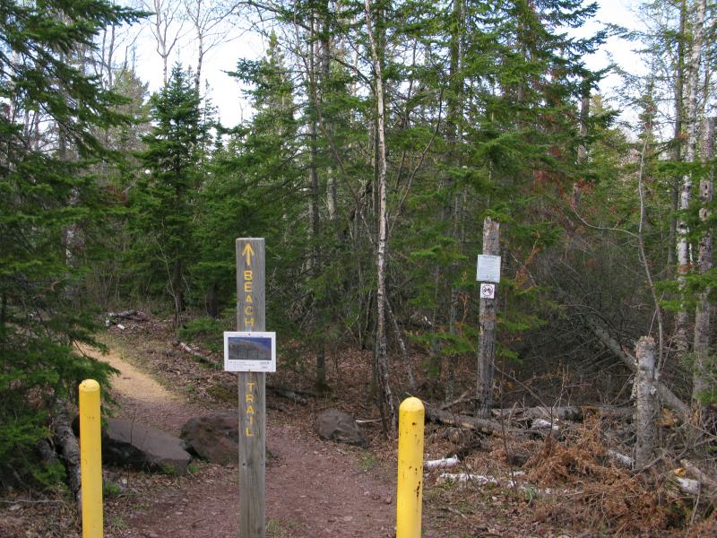 Posts and signs at the trailhead