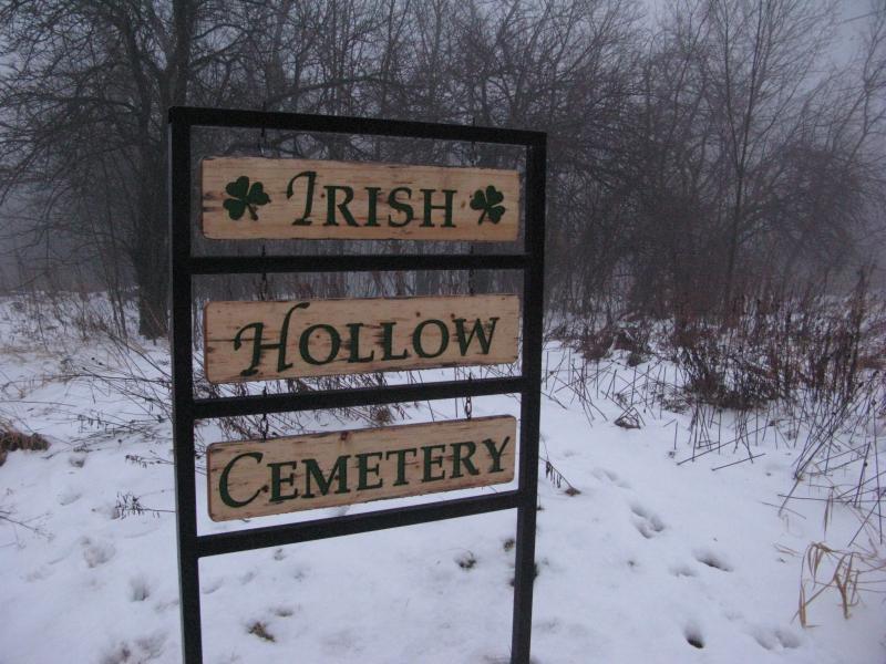 Aged sign for Irish Hollow Cemetery