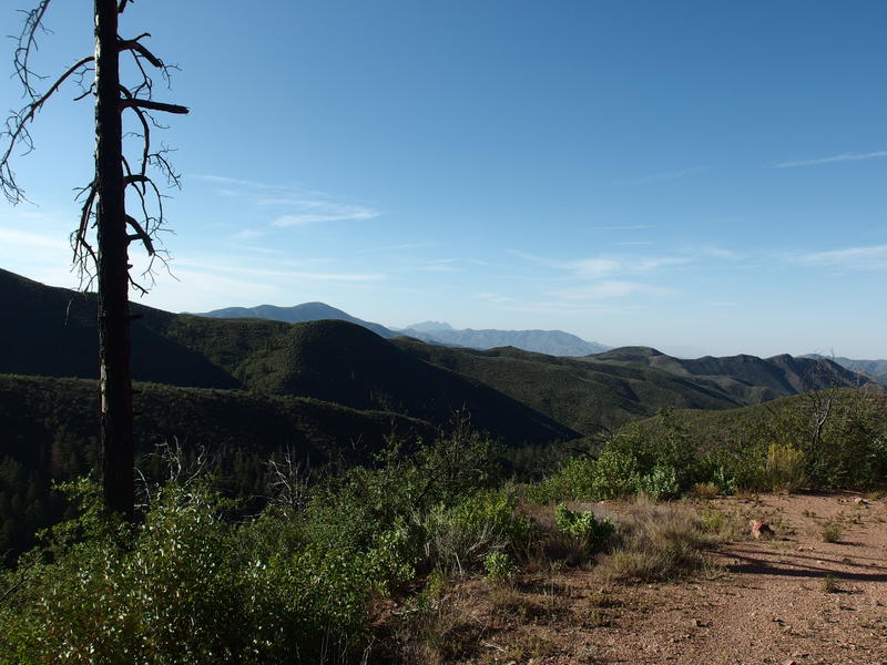 A hazy Four Peaks poking up far to the south