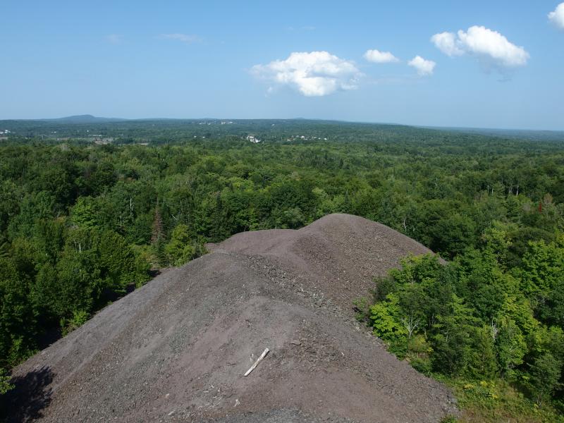 Snaking lower piles of rock