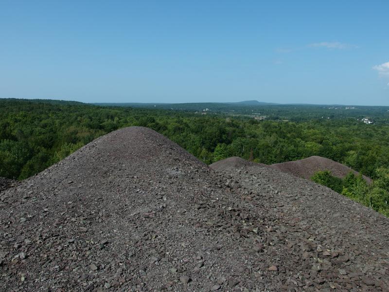 Mounds of poor rock and view beyond