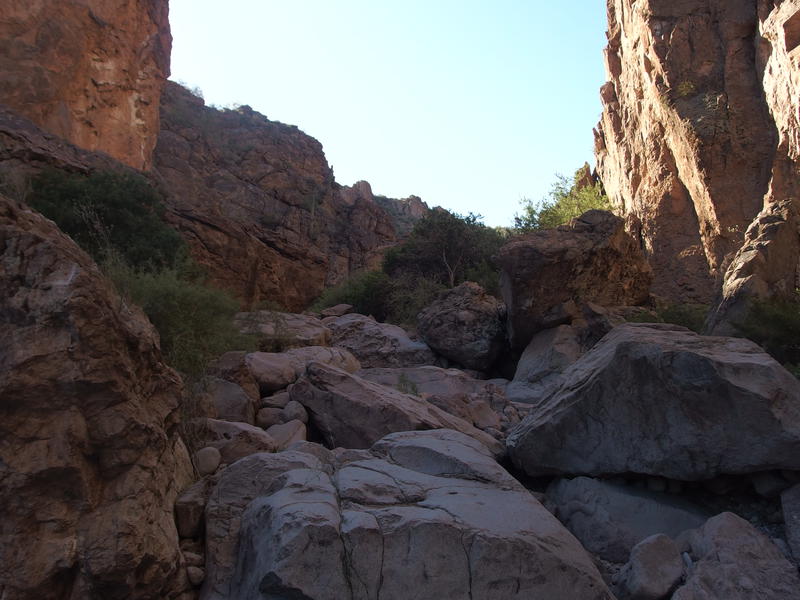 Huge boulders blocking the narrow canyon