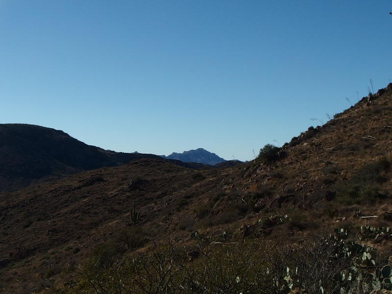 A hint of the Superstition Ridgeline, far to the west