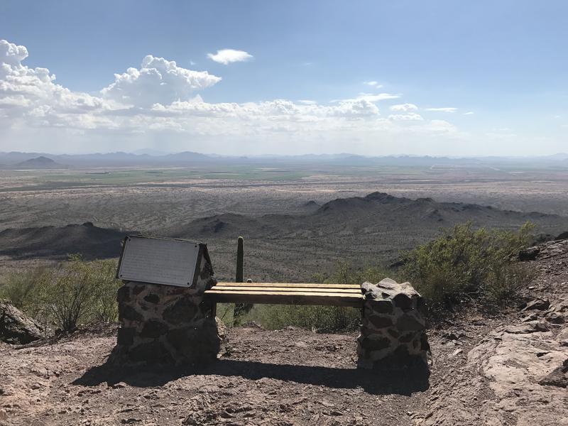 Bench and plaque at the saddle