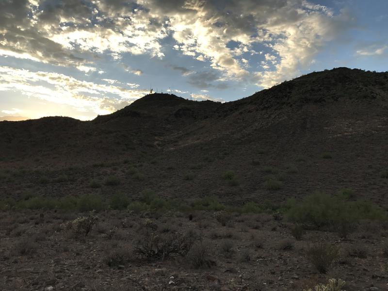 Sun setting behind Shaw Butte