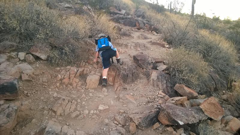 Noah hauling up the steep trail