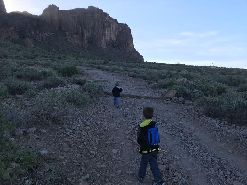 Two hikers along the rocky path