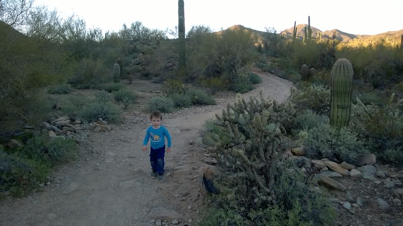 A tired, dirty Noah heading down the trail