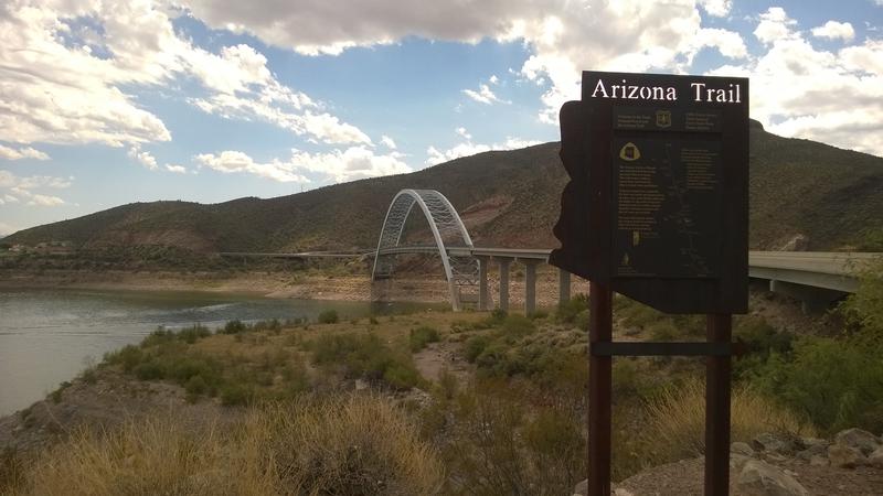 Roosevelt Bridge beyond the trail sign