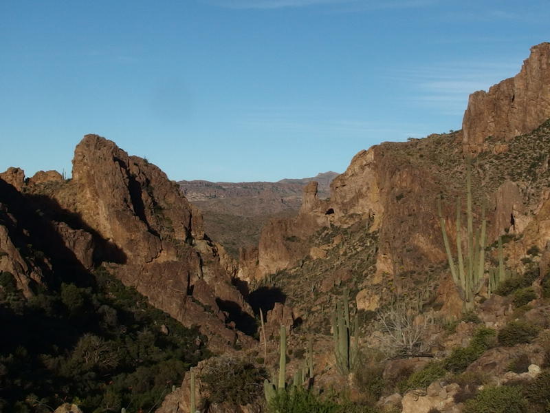 Steep canyon with Herman's Cave hanging out near the end